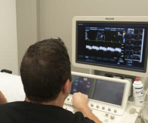 Ultrasound student studies technology at MedQuest College
