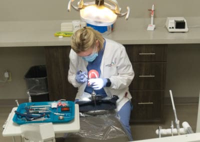 Dental Assisting Student Working Hard
